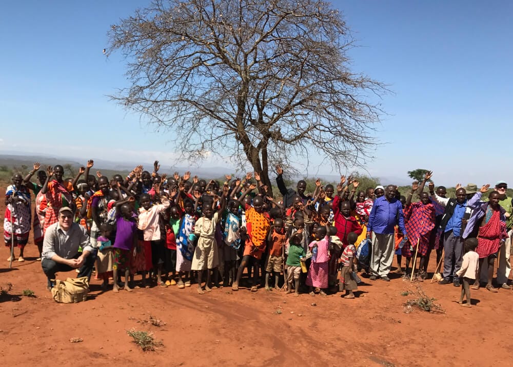 Bush church Sharing stories together under a tree in Kenya 