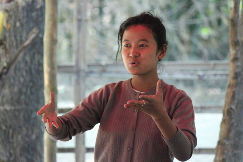 Woman sharing stories in Indonesia